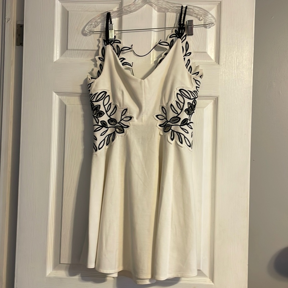 Backless White dress with black detail and cut outs